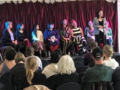 Menstrual Justice event: Monica Lennon MSP speaks on a stage